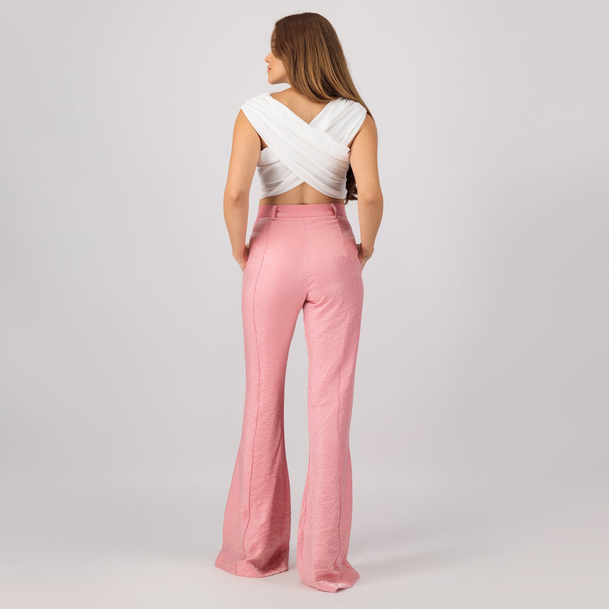 Crushed blush pink and silver shimmer high-waist palazzo pants, reflecting  a contemporary and stylish design.